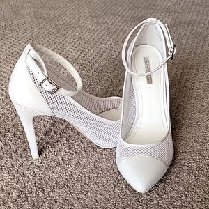 BCBG white mesh heels.